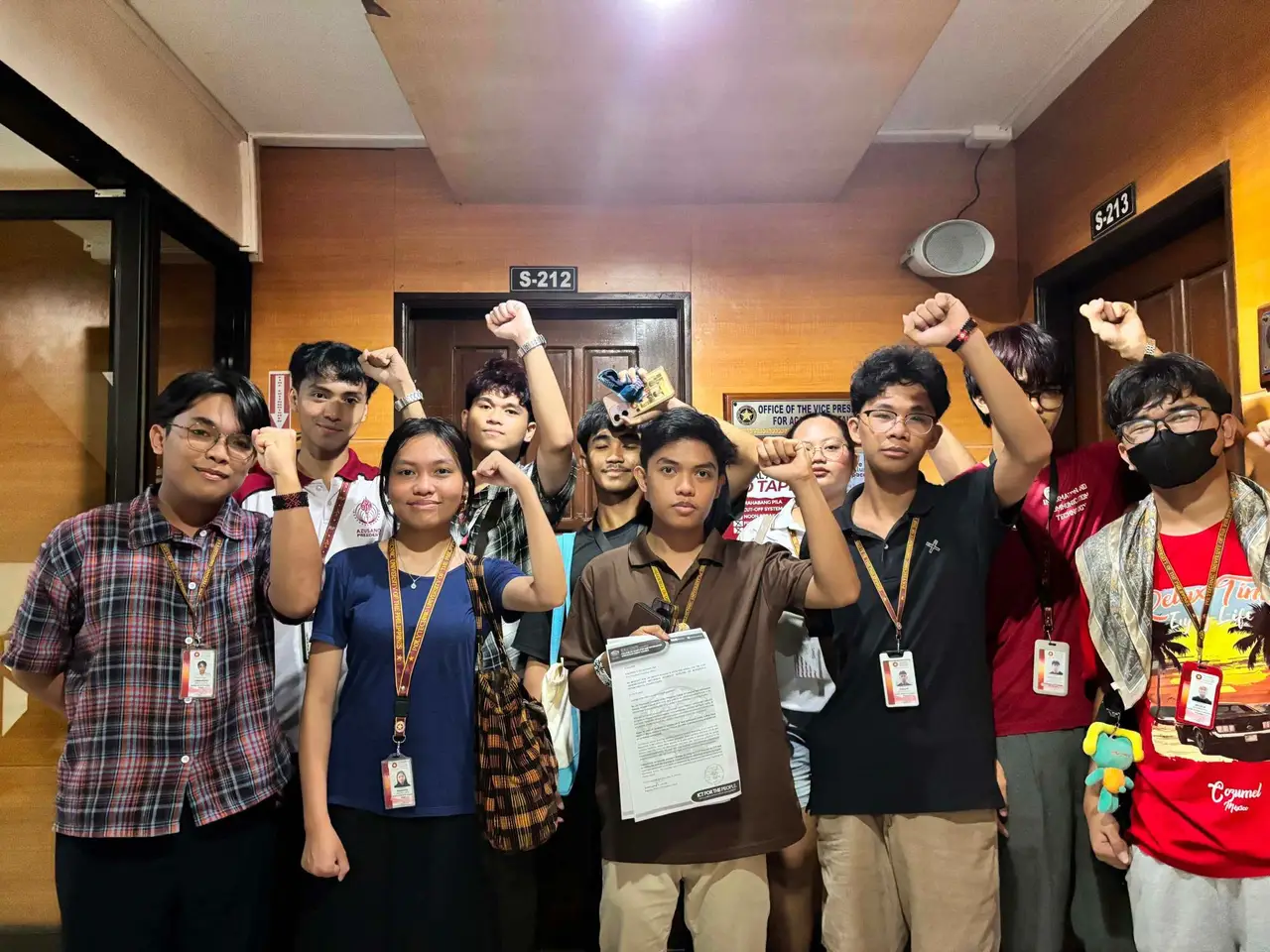 Students standing together inside the college
